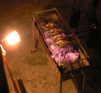Fish cooking on Greek Barbecue