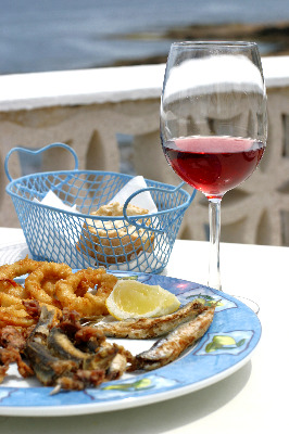 Plate of Greek Fried Fish with Wine
